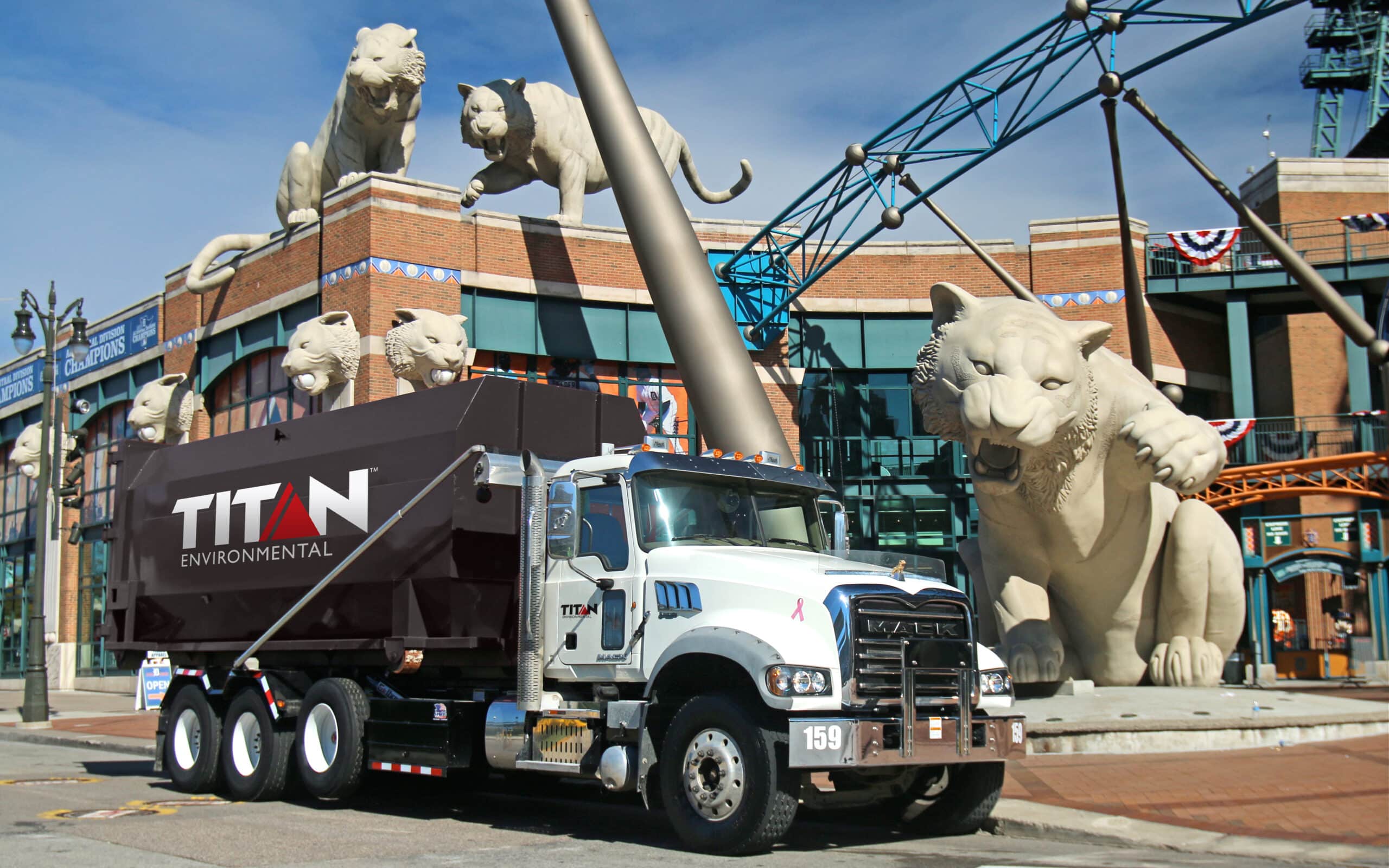 Titan Environmental Roll off Dumpster Truck in front of Comerica Park, Detroit Michigan.