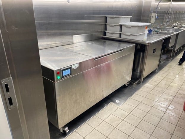 Image of our Food Digestor in a commercial kitchen.
