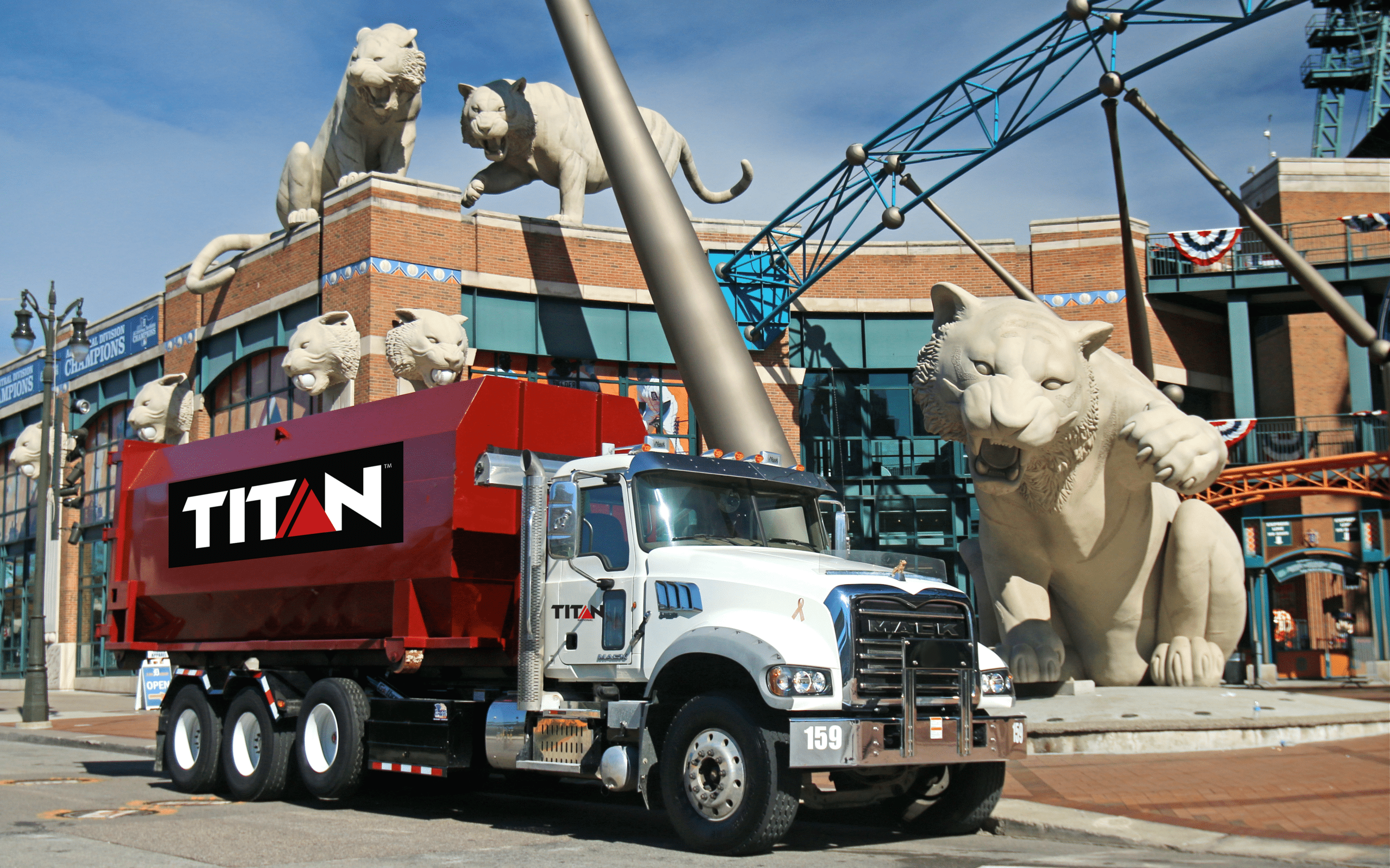 Titan Environmental Roll off Dumpster Truck in front of Comerica Park, Detroit Michigan.